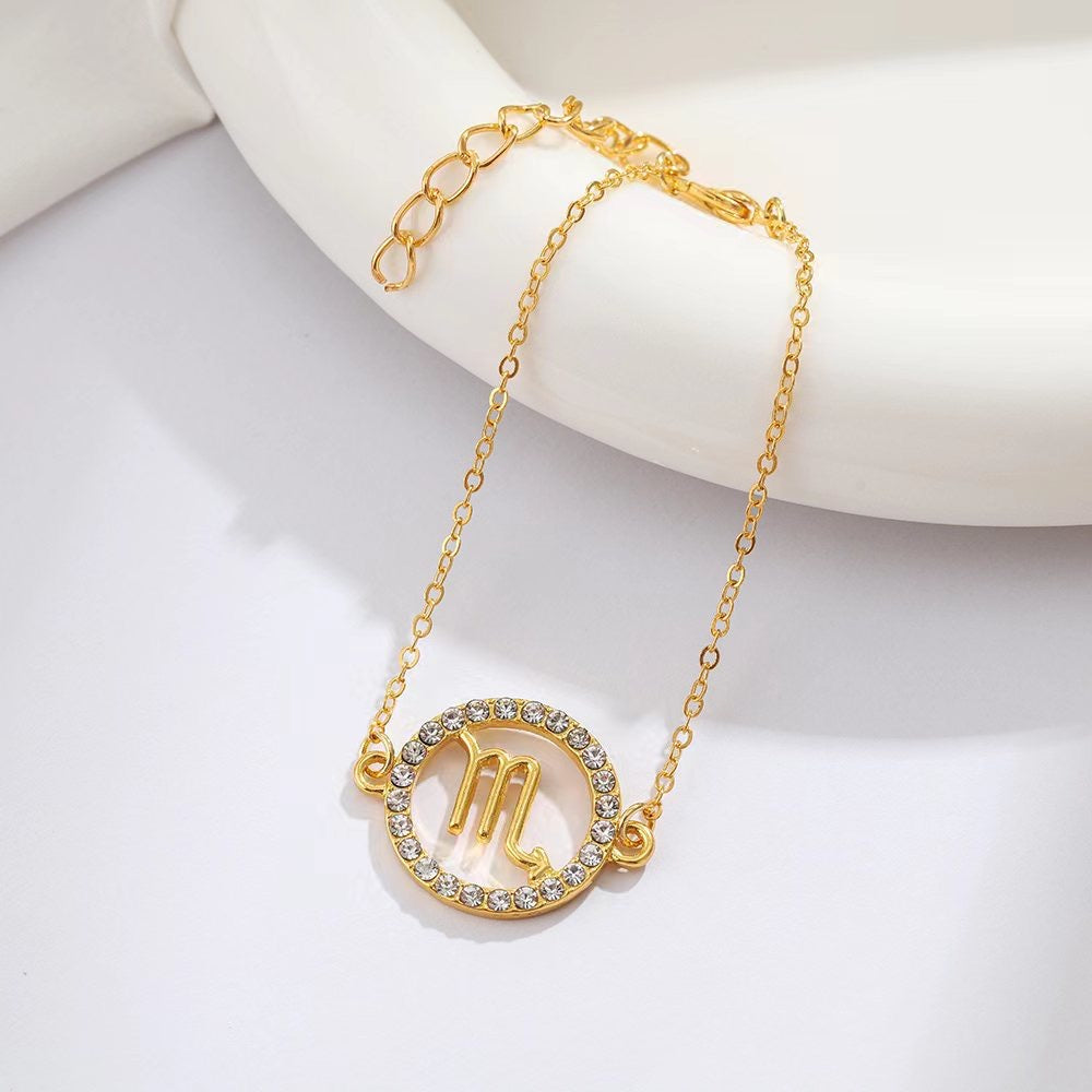 Scorpio Faux Diamond Embedded Zodiac Bracelet (Gold Tone)
