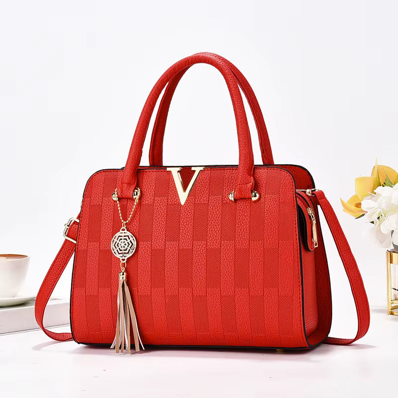 Handbags + Handbag Accessories Collection
