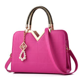 Handbags + Handbag Accessories Collection